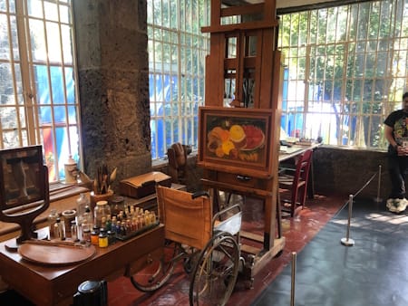 Frida Kahlo’s wheelchair and adjustable easel in her La Casa Azul studio