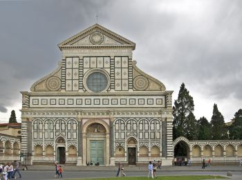 A photo of Leon Battista Alberti's façade of Santa Maria Novella depicting the classical design, and the scroll motifs that were, subsequently, widely adopted. The building is domicile to Masaccio's <i>Holy Trinity</i> (1428) Giotto's <i>Crucifix</i> (c. 1290), and other noted masterworks.