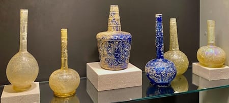 Early Islamic cut and engraved glass bottles