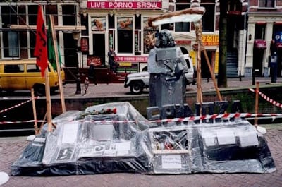 <i>Spinoza Monument</i> (1999) was the first of Hirschhorn's street Monuments. Mixed media. W 139, Bijlmermeer, Amsterdam