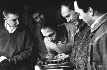 Rauschenberg with Jasper Johns, John Cage, and others in Rauschenberg's or Johns's Pearl Street studio, New York, ca. 1955