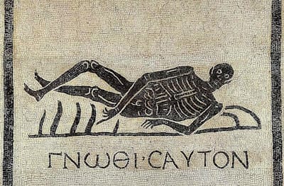 A Roman mosaic, circa 1st Century AD. The Greek inscription reads 'Know thyself', meaning know that you are mortal.