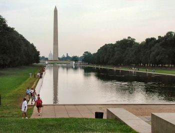 In Washington D. C., atop the dome of the Capitol Building sits a figurative statue of an allegorical figure symbolizing freedom. In contrast with this, the Washington Monument memorializes the first president in an abstracted manner, through this imposing heliocentric obelisk, which connotes enlightenment and immortality.