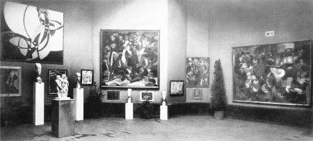 This photograph of the 1912 Salon d'Automne shows paintings (from left to right) by Frantisek Kupka, Jean Metzinger, Francis Picabia, and Henri Le Fauconnier, as well as a sculpture by Joseph Csaky, front left, with two sculptures by Amedeo Modigliani behind it.