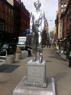 Sculptor Rob Pruitt's chrome Warhol monument, installed near Union Square, New York City, stands at almost ten feet tall.