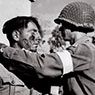 An American medic treats a captured German soldier, Sicily, July 1943 (1943)