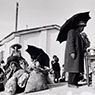 Immigrant families wait to be assigned a tent at the transit camp Shaar Alyjah, Israel (1949-51)