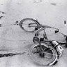 Fallen bicycle of teenage boy just killed by a sniper (1994)